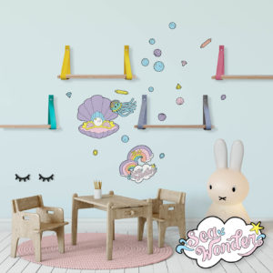 Sea creature wall decals featuring baby clam, rainbows and squid in a baby nursery.