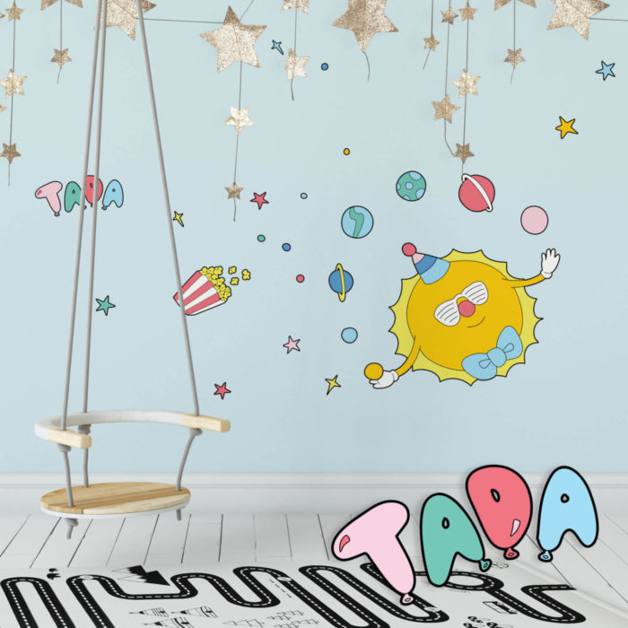 Circus Space inspired wall decals featuring a juggling sun in a playroom.