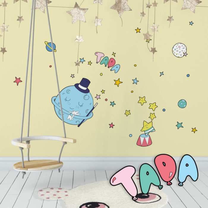 Circus Space inspired wall decals featuring moon and stars in a playroom.