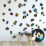 Leopard Print wall decals in a boy's playroom in black and rainbow colours.