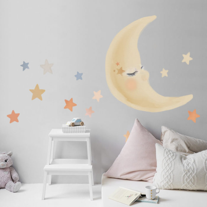 Moon and stars watercolour wall decal in a nursery.